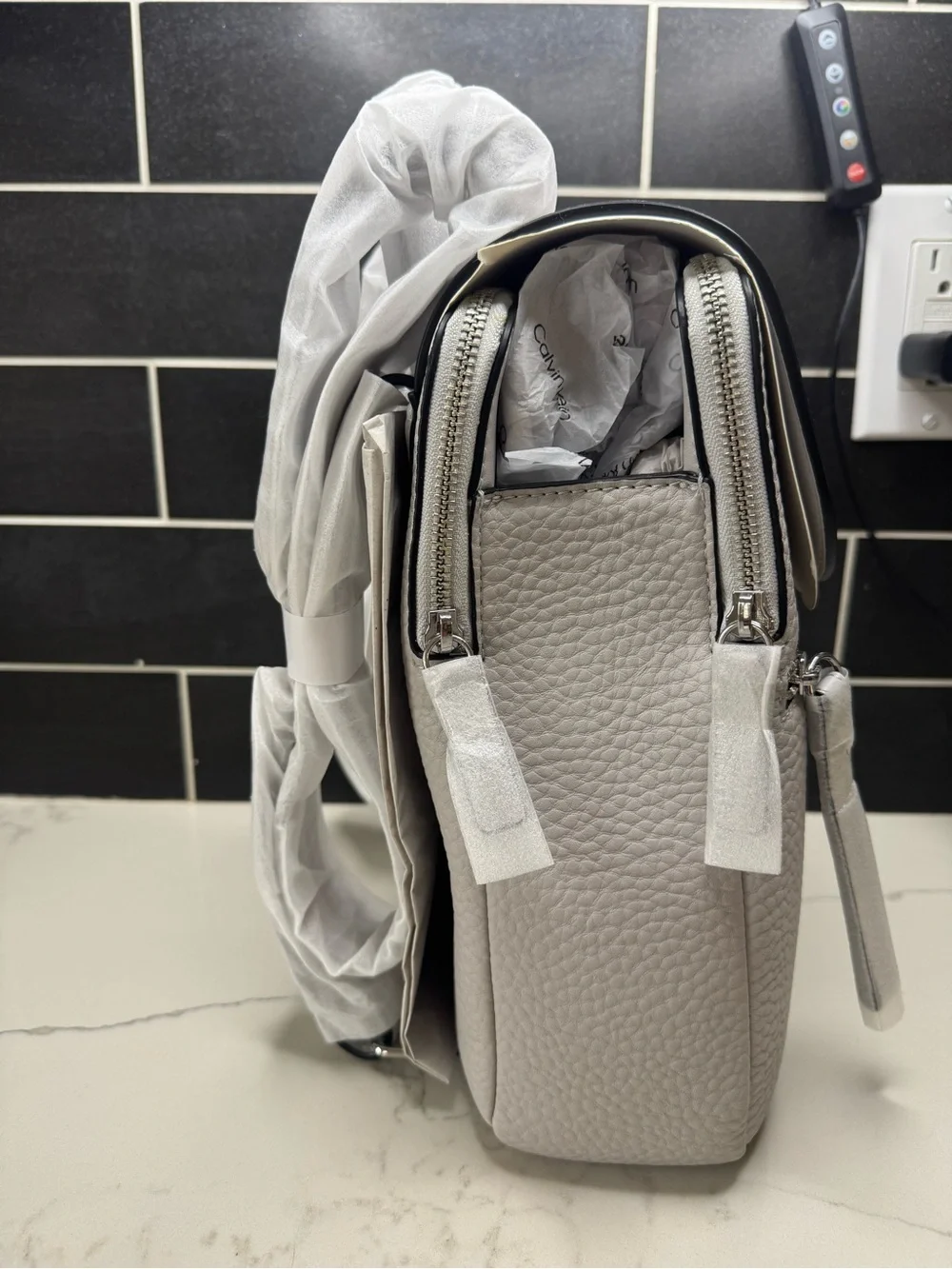 Calvin Klein Light Gray Pebbled Leather Mini Backpack